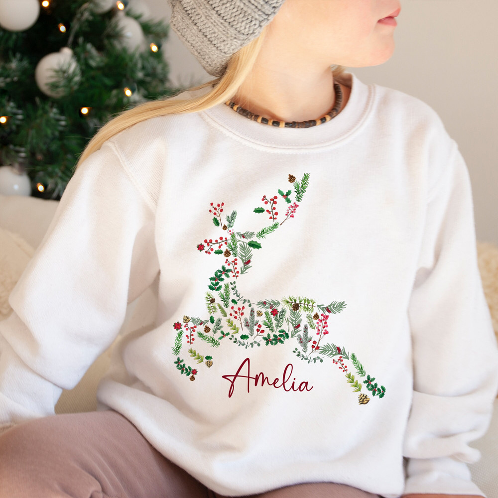 Personalised Reindeer Christmas Jumper with Flowers Name Unisex Kids Size Jumper Day Young Toddler Girl Youth Child Children Daughter Son.jpg