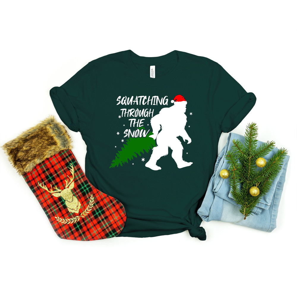 Squatching Through The Snow Shirt, Big Foot Shirt, Christmas Shirt, Christmas Tree Shirt, Merry Christmas Shirt, Christmas Gift.jpg