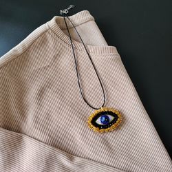 Nazar blue eye bead pendant, pendant on a cord for the neck, female eye choker