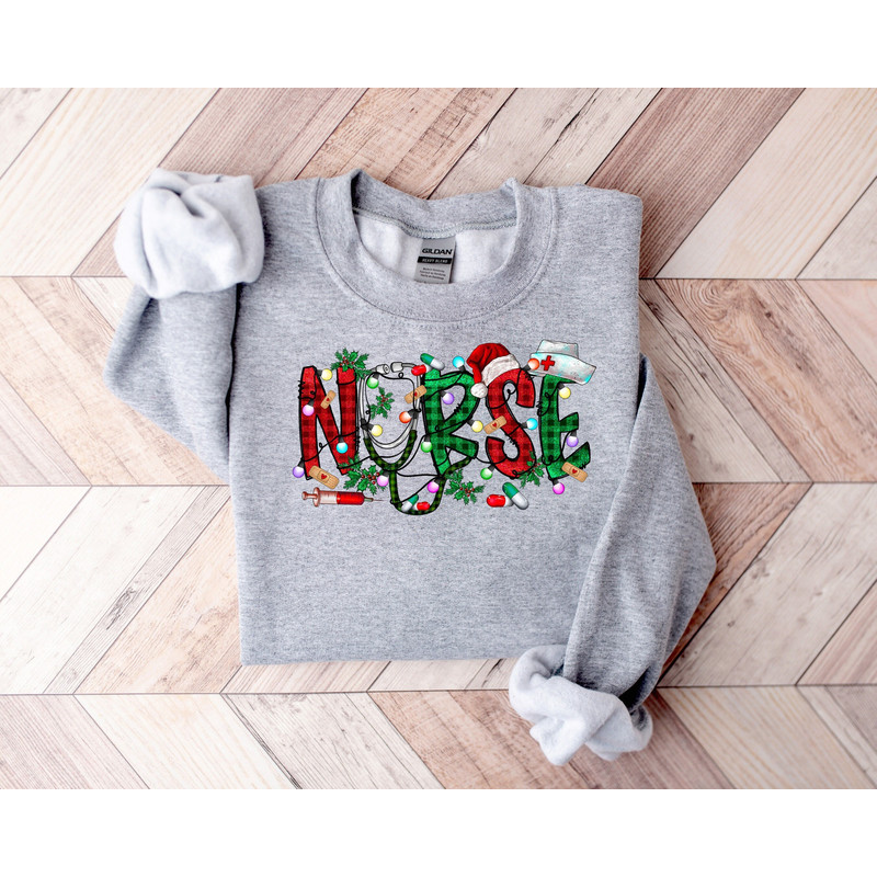 Christmas Nurse Sweatshirt,Christmas Nursing Sweatshirt,Nurse Christmas Shirt,Nurse Shirt,teacher gifts,Gift For Women,Holiday Nurse shirt.jpg