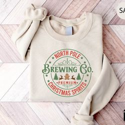 north pole brewing co shirt, premium christmas spirits, christmas tee, christmas gift, christmas brewing co, cool reinde