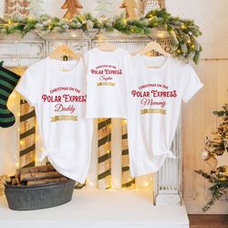 matching polar express family christmas t- shirts with names and gold foil believe detail christmas tshirts festive fa