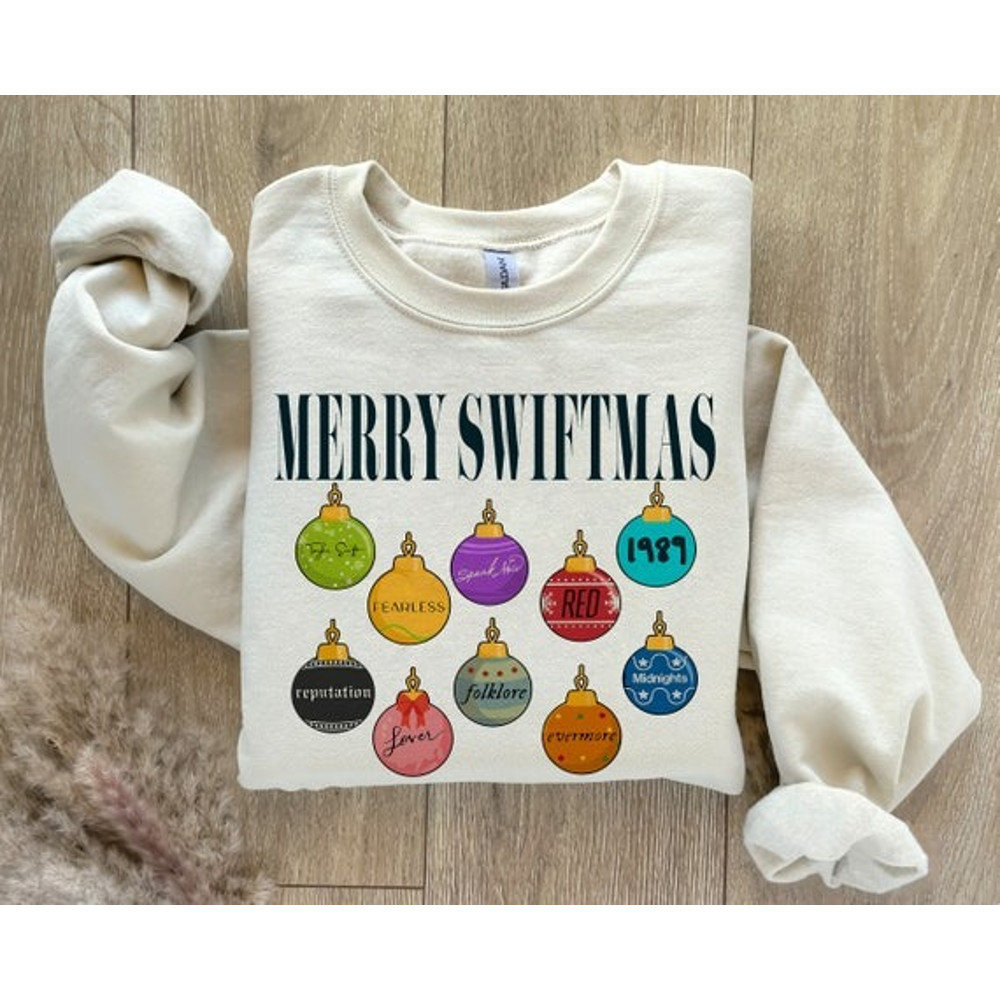 Merry Swiftmas Sweatshirt, Cute Famous Christmas Ball Shirt, The Eras Tour Christmas shirt, The Eras Tour Christmas TS Version, Gift For Fan.jpg
