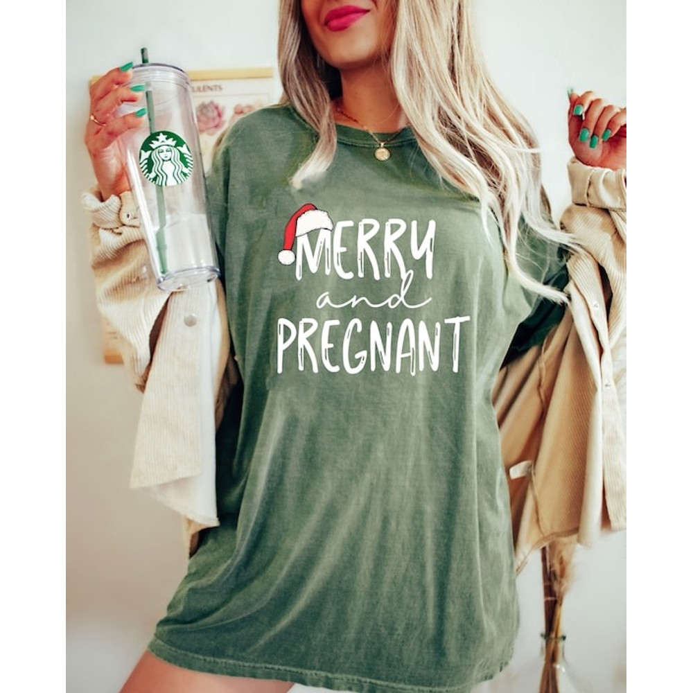 Comfort Color Merry and Pregnant Shirt, Pregnancy Announcement Shirt, Christmas Pregnant Shirt, Funny Pregnancy Tee, Xmas Baby Shirt.jpg