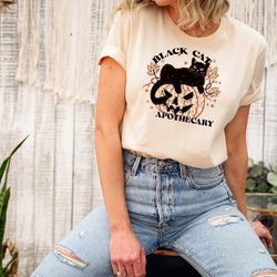 black cat apothecary shirt, retro halloween comfort colors shirt, fall season t-shirt, vintage halloween shirt, pumpkin