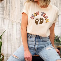 nicu team shirt, nicu nurse shirt, nurses swaddle specialist, labor and delivery nurse shirt, mother baby nurse shirt