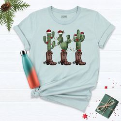 christmas cactus cowboy shirt, christmas country shirt, country christmas tee, western christmas tees, cactus lover tee,