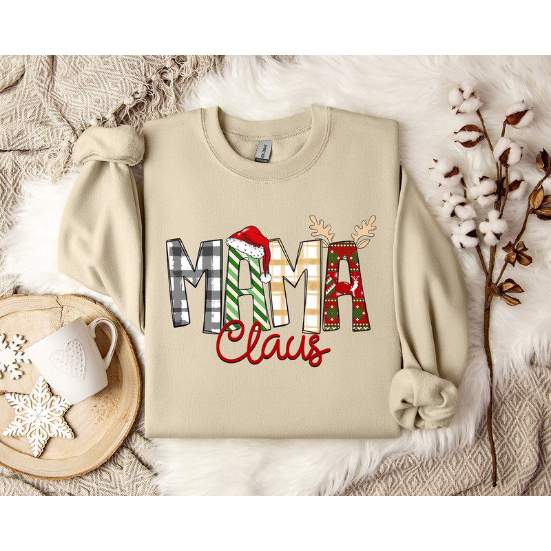 Mama Claus Christmas Hat Theme Sweatshirt - Festive Holiday Apparel - Cozy Xmas Pullover - Winter Fashion - Seasonal Motherhood Gift.jpg