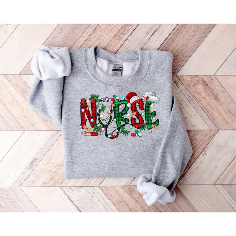 Christmas Nurse Sweatshirt,Christmas Nursing Sweatshirt,Nurse Christmas Shirt,Nurse Shirt,teacher gifts,Gift For Women,Holiday Nurse shirt.jpg
