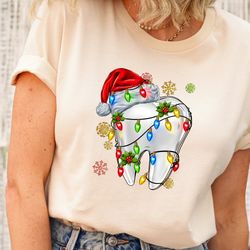 christmas dentist shirt, gift for dentist, dental tooth christmas lights shirt, santa hat tooth shirt, dental assistant