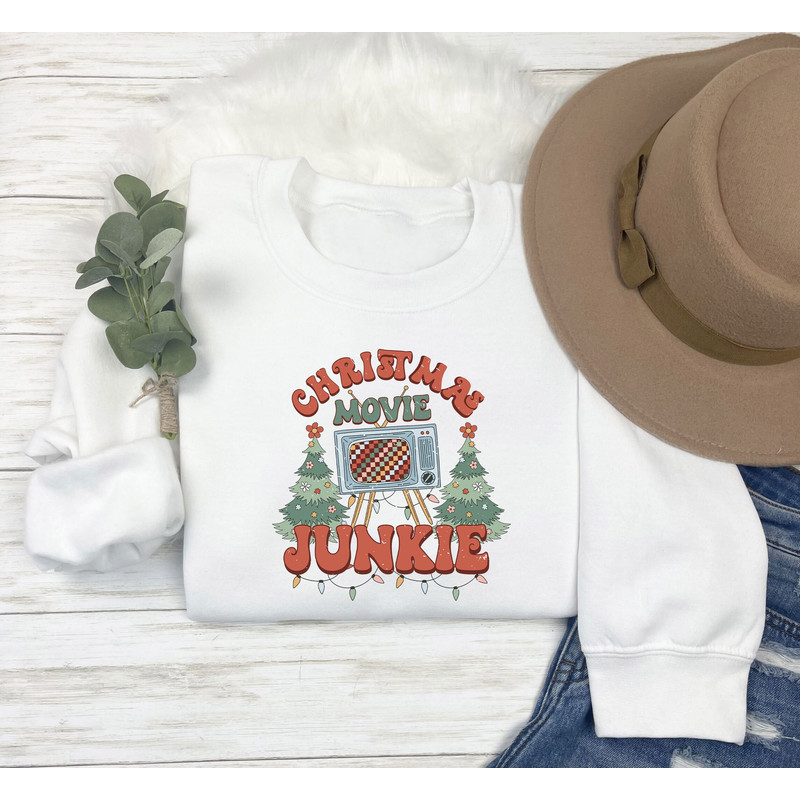 Christmas Movie Junkie Sweatshirt Gift For Movie Lovers,Christmas Movie Shirt, New Year Sweater, Retro Xmas Shirt, Christmas Crewneck Hoodie.jpg
