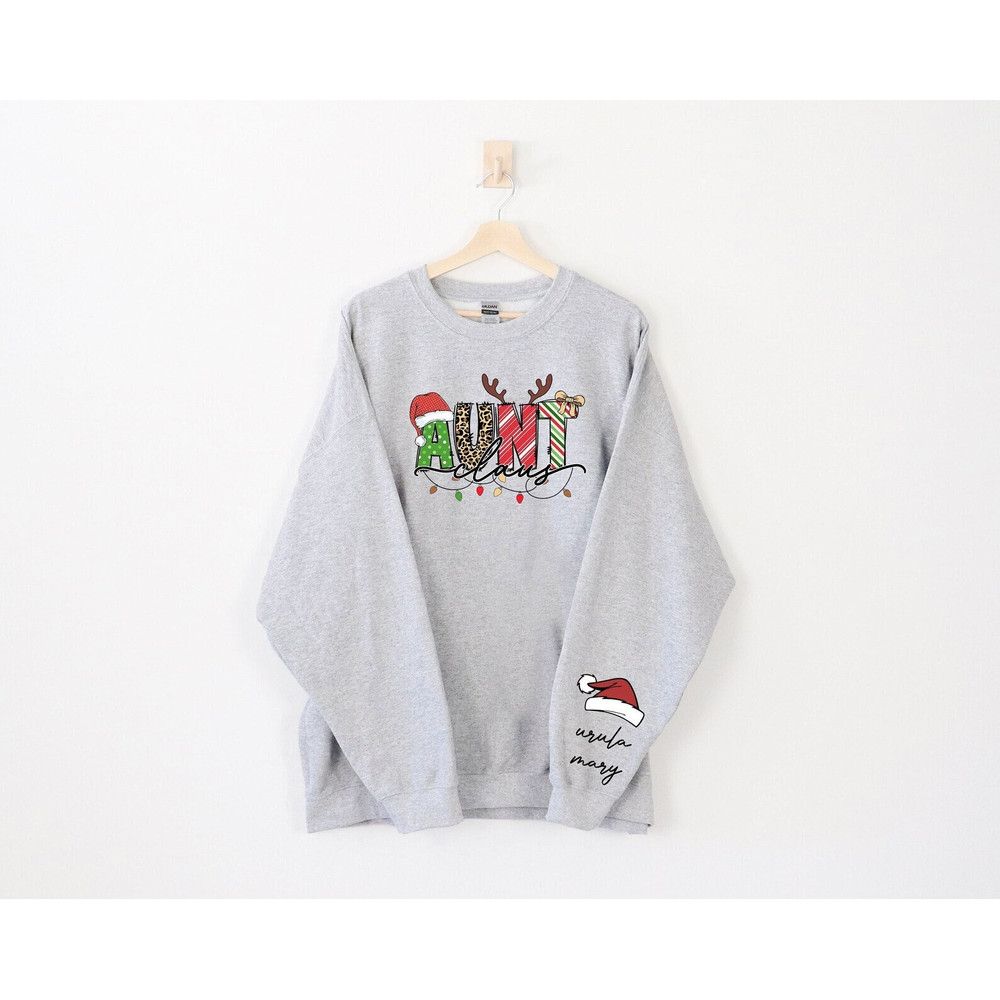 Groovy Custom Aunt Claus Christmas Lights Crewneck Sweatshirt Gift From Niece& Nephew,Christmas Aunt Hoodie,Funny Aunt Shirt,Cute Auntie Tee.jpg