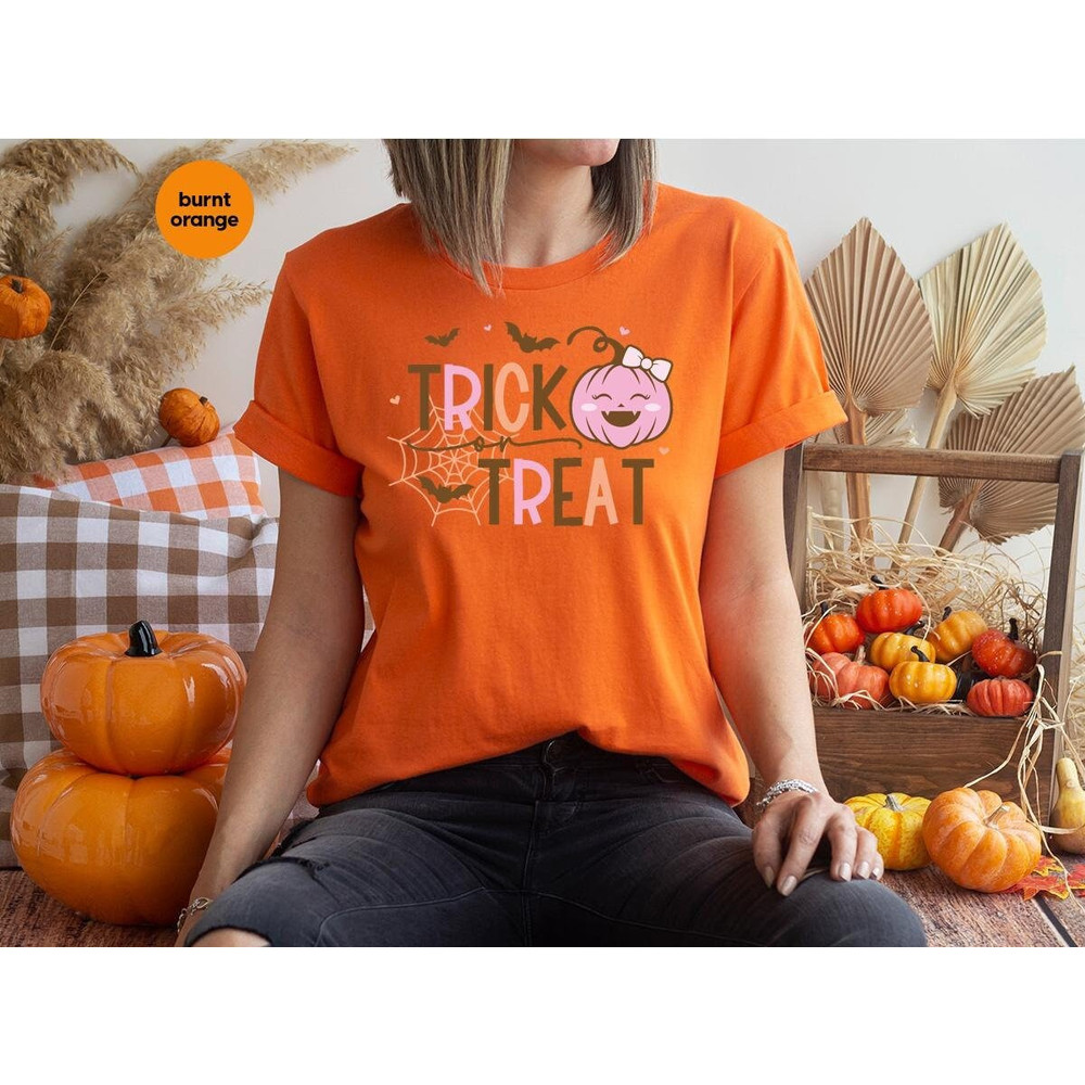 Cute Halloween Shirt, Pumpkin Crewneck Sweatshirt, Trick or Treat Graphic Tees, Gift for Her, Spooky Season Clothing, Women Vneck T-Shirt.jpg
