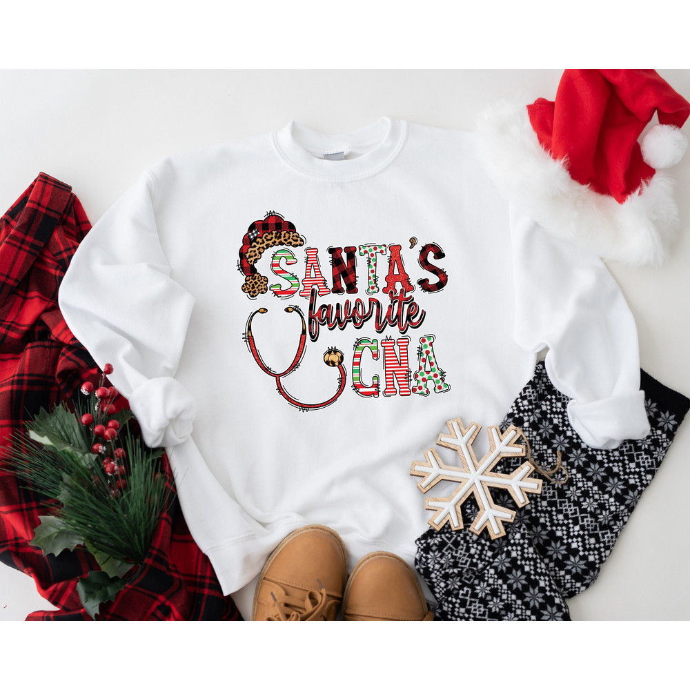 Santa's Favorite CNA Shirt, Christmas Santas Nurse Shirt, CNA Winter Fashion, Funny Christmas Shirt, Gift Nurse, RN Shirt for Christmas.jpg
