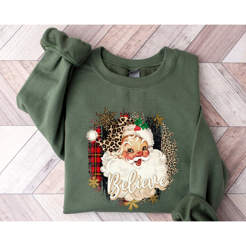 Christmas Sweatshirt, Believe Santa Sweatshirt, Believe Sweatshirt, Christmas Santa Claus Shirt, Christmas Family Shirt, Leopard Santa Shirt.jpg