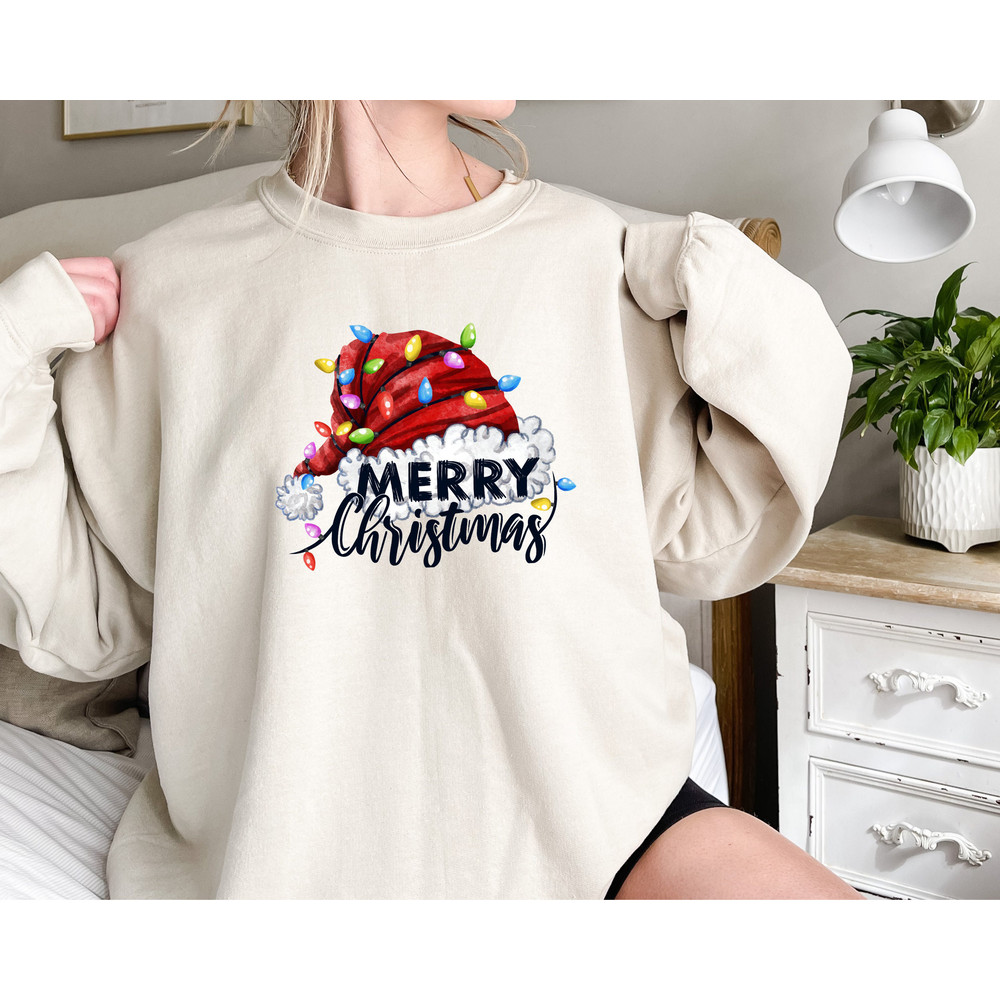 Merry Christmas Sweatshirt, Santa Hat Sweatshirt, Merry Christmas Hoodie for Women, Christmas Lights, Holiday Sweatshirt, Winter Sweatshirt.jpg