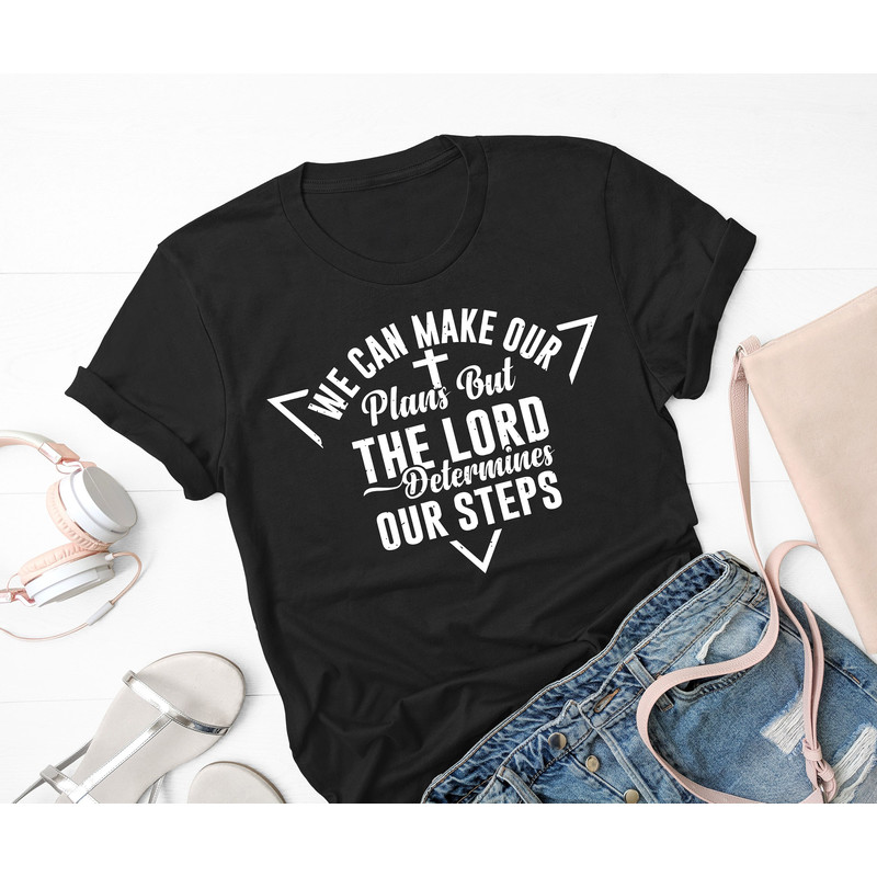 We can make our Plans but the Lord Determines our steps shirt, Jesus is Lord tee, Faith based shirt, Scripture shirt, Religion Tee.jpg