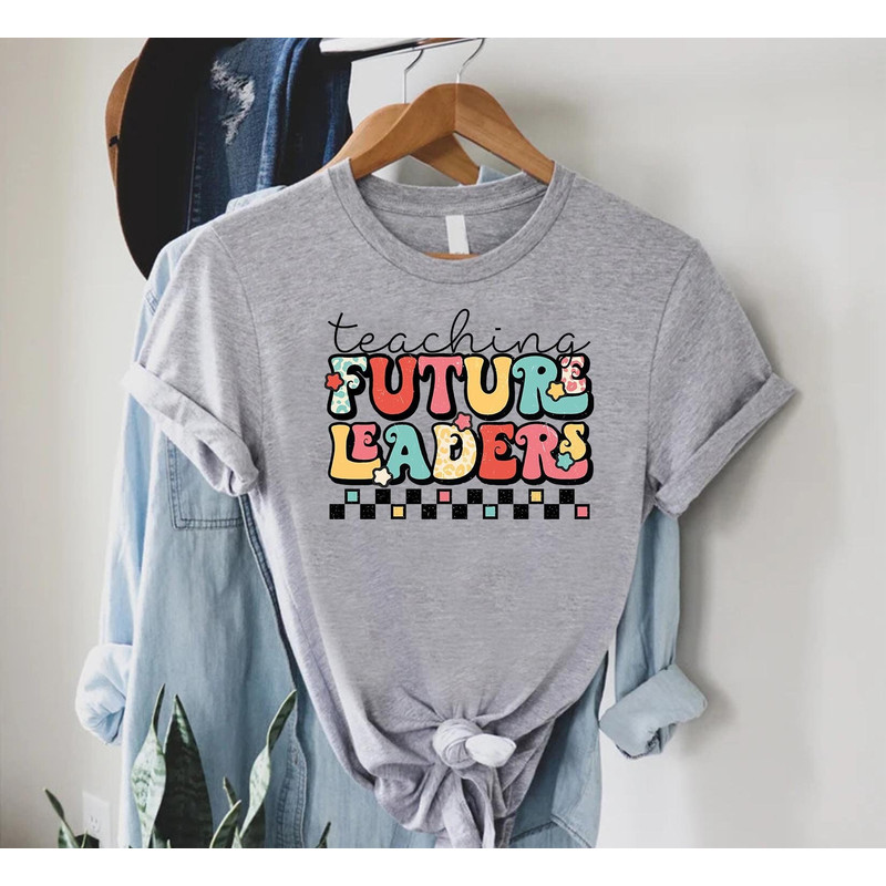 Teaching Future Leaders T-Shirt, Teacher Shirt, Teacher Life Shirt, Gift for Teacher, New Teacher Gift, Motivational Teacher, Teaching Shirt.jpg