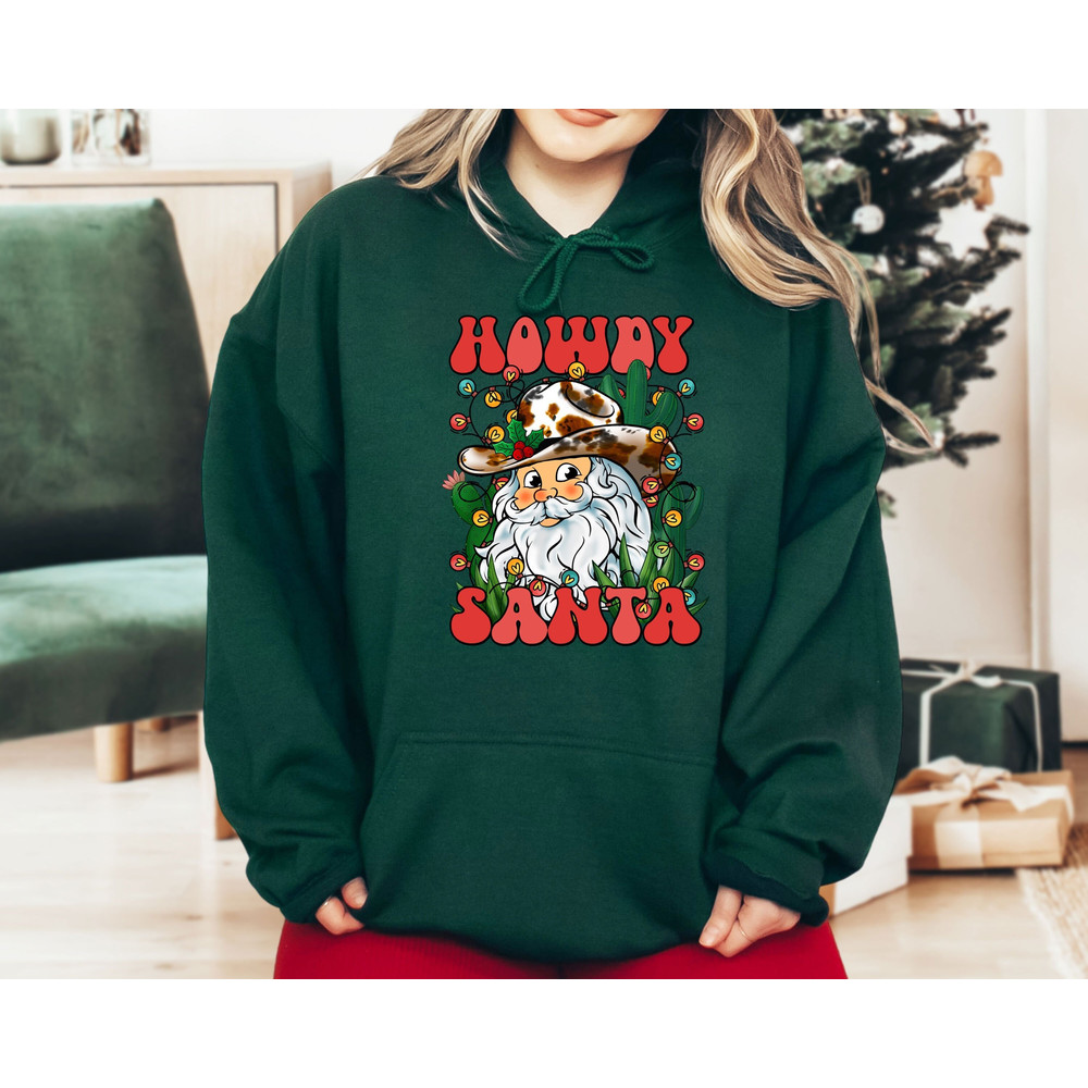 Howdy Santa Hoodie, Christmas Western Hoodie, Christmas Vacation Hoodie, Christmas Party Hoodie, Christmas Holiday Hoodie, Christmas Gifts.jpg