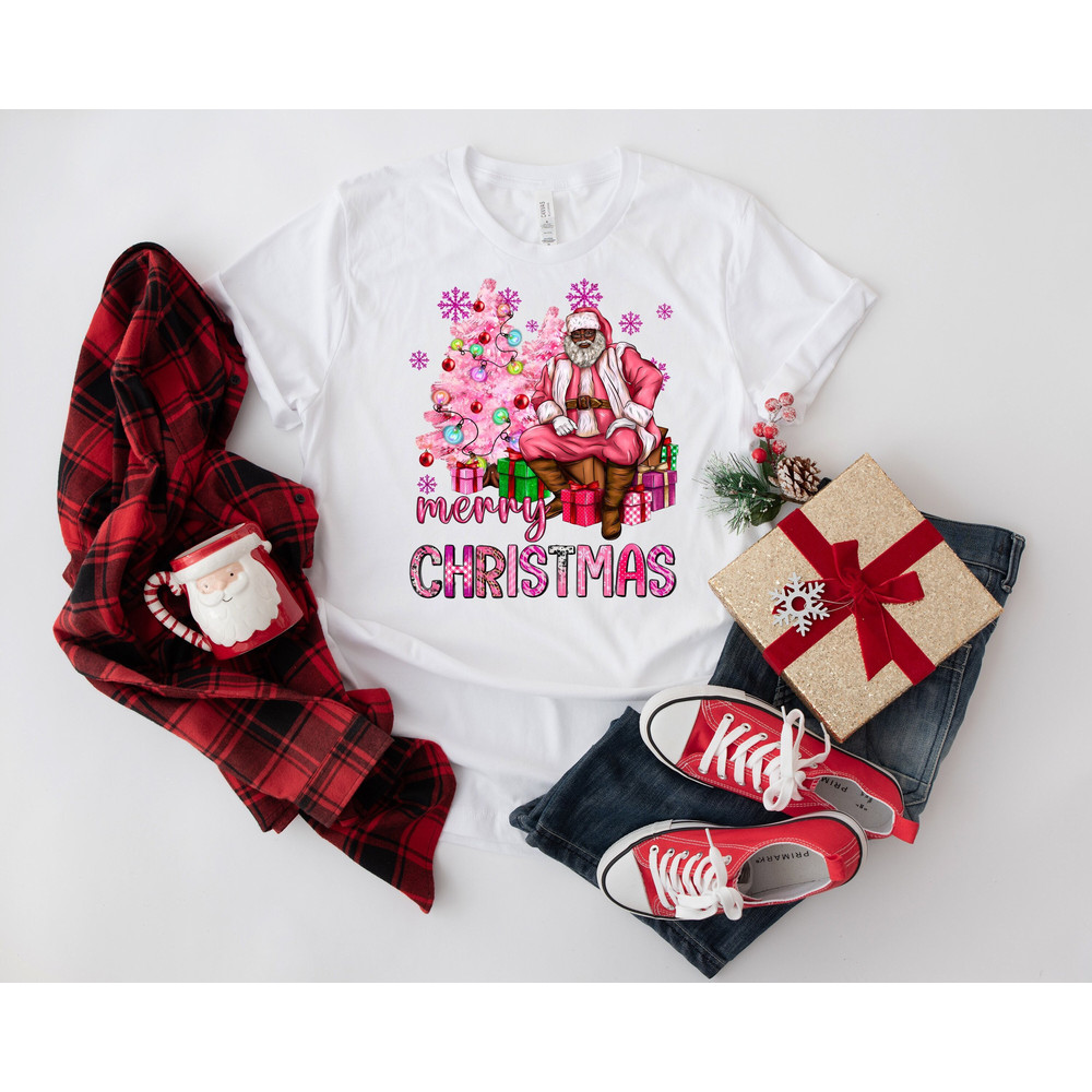 Pink Merry Christmas Unisex Shirt, Brown Santa, Unisex Shirt, Grinch Era, Boujie Era, Christmas, Trending Christmas, Christmas Party.jpg