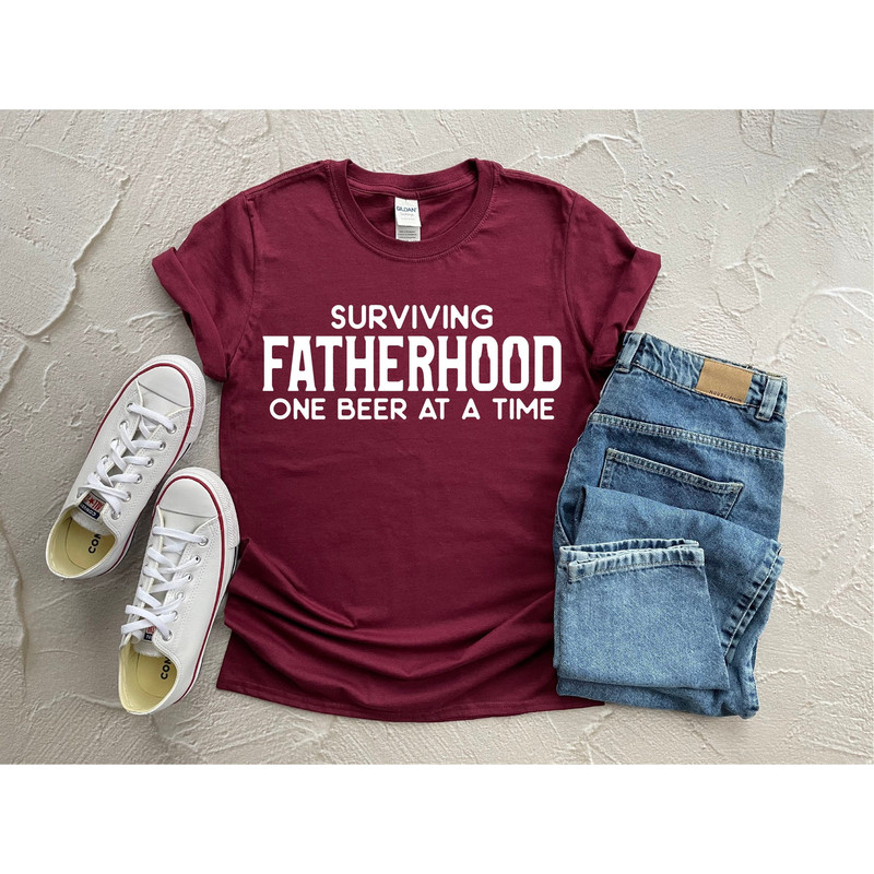 Surviving Fatherhood One Beer At A Time Shirt, Father's Day Gift, Dad Shirt, Gift For Father,Best Father Shirt,Gift For Dad,Dad Is Legend.jpg