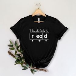 i teach kids to read shirt, gift for reading teacher, reading specialist shirt, science of reading shirt, reading interv