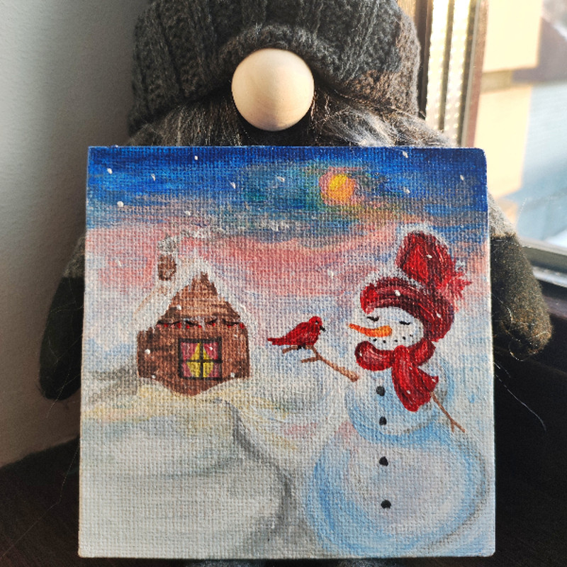 Snowman painted Cardinal bird.jpeg