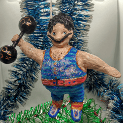Strongman from the Fat Man Circus A very original and exclusive Christmas tree toy