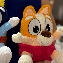 Handmade crochet baby bingo dog, perfect gift for kids. Adorable and cuddly, this unique toy will bring joy to any child