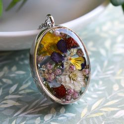 Real pansy, buttercup, hydrangea pendant. Flowers in resin.