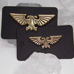 A pair of Large and Medium Imperial Aquila badges (Solid Brass)