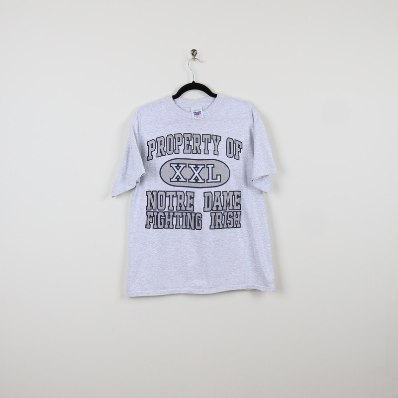 Vintage 90s Property Of Notre Dame Fighting Irish XXL Gray Graphic Tee University of Notre Dame T-shirt Size Large.jpg