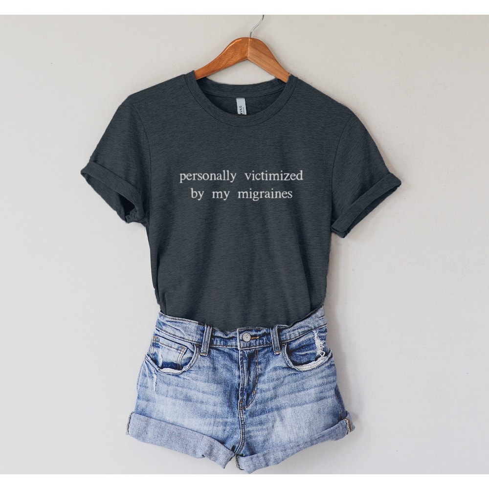 Personally Victimized By My Migraines Shirt Or Sweatshirt.jpg