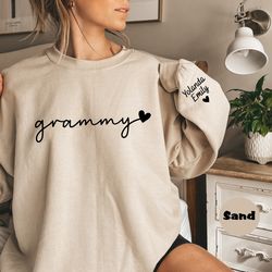 personalized grammy sweatshirt with grandkids names on sleever