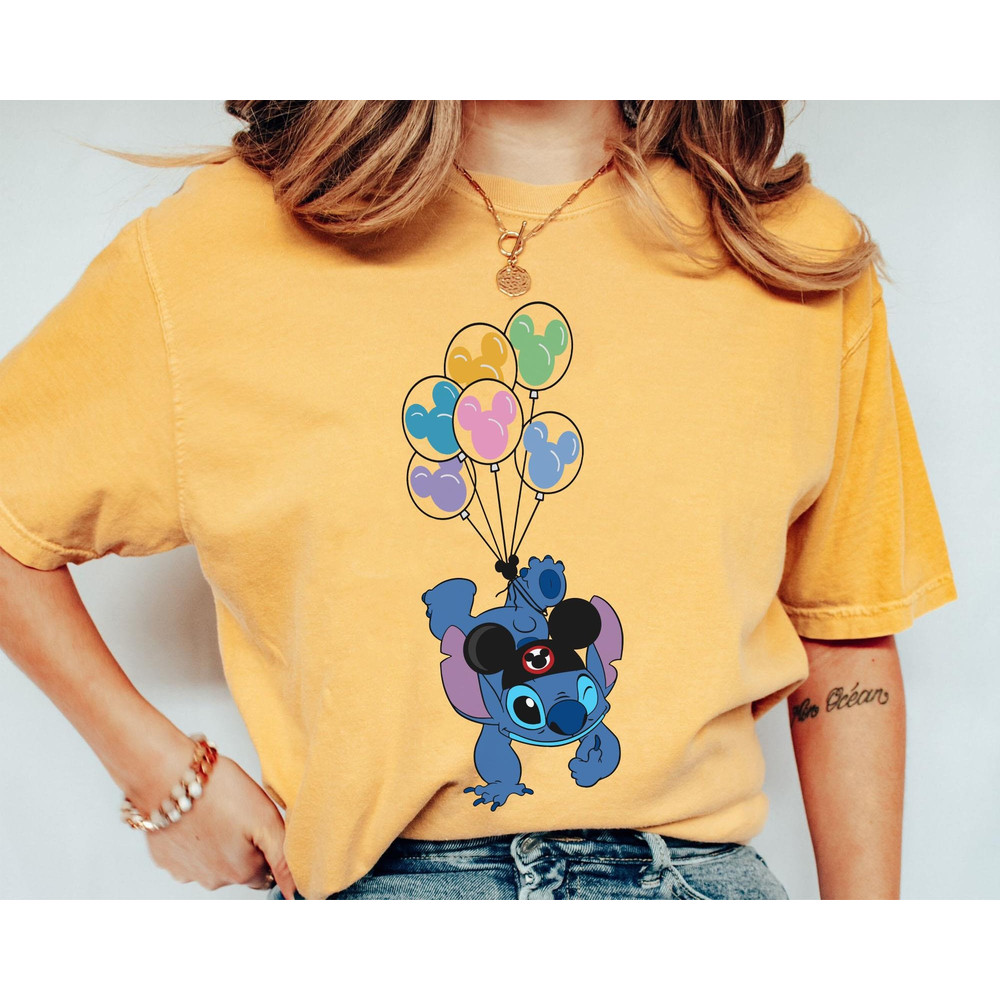 Stitch Wears Mickey Ears with Balloons Comfort Colors Shirt, Lilo & Stitch Disney Washed T-shirt, Disneyland Outfit, Walt Disney World Trip.jpg