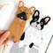 DIY felt crafts - kids long French bulldog bookmarks in authors hand laying on the opened book