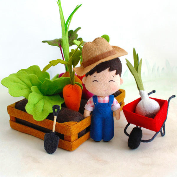 Felt farm toys - farmer baby boy and his big vegetable garden on the beds
