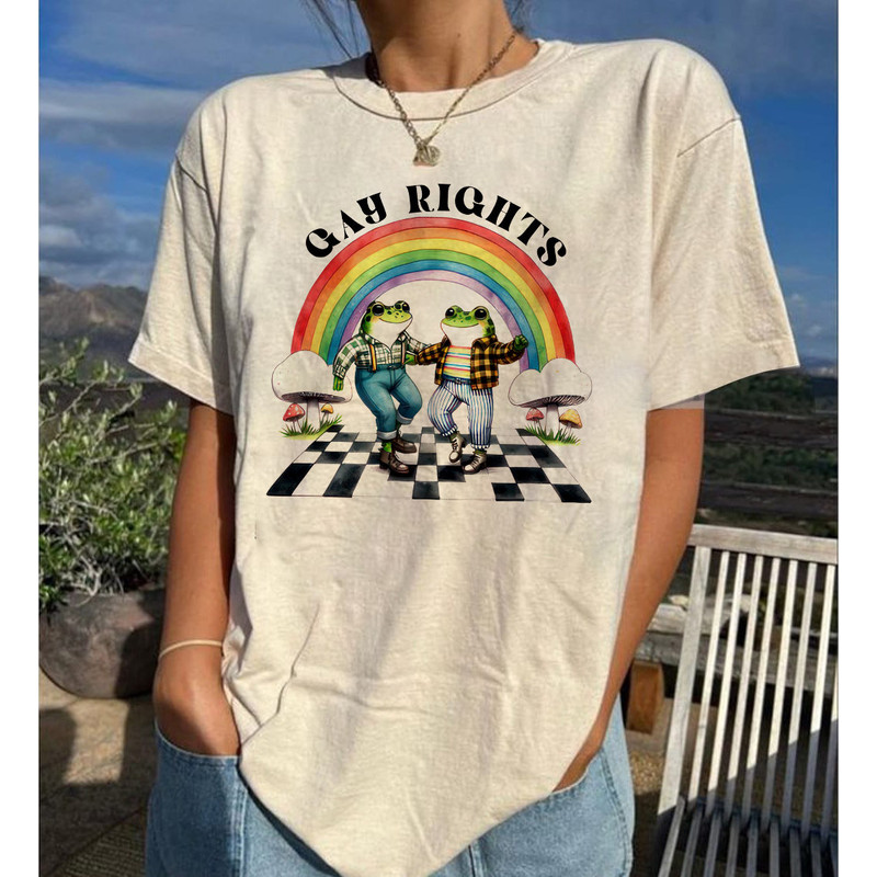 Fun and Playful Gay Rights LGBT T-Shirt, Unisex Graphic Tee with Frogs and Rainbow, Unisex Graphic Tee, Unisex Equality Tee.jpg
