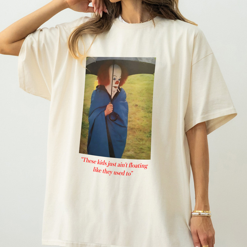 Funny Pennywise the Clown T-Shirt, Retro 90s Horror Movie Pennywise from Stephen King's IT Smoking a Cigarette Photo Graphic Tee Shirt.jpg