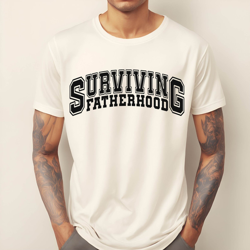 Comfort Colors Surviving Fatherhood Shirt, Retro Daddy Tshirt, Father's Day Tshirt, Gifts for Dada, Cute Men Shirt, Fatherhood Tee.jpg