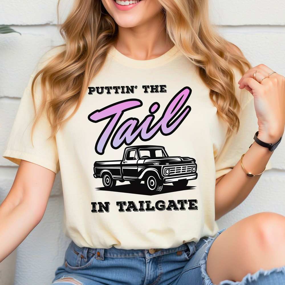 Puttin' The TAIL in Tailgate, Cute Country Girl Shirt, Unisex Funny 4th of July tshirt for Women, Best T-Shirt for Nice Butts and Tailgating.jpg