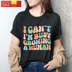 i cant im busy growing a human funny mama t shirt happy place for music lovers