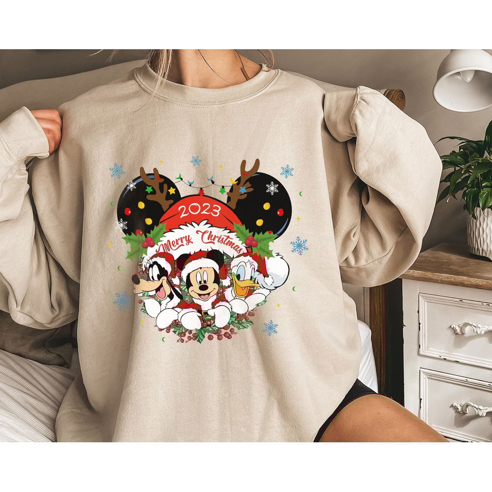 Mickey Donald Goofy Merry Christmas 2023 Mickey Ear Santa Hat Shirt Family Matching Walt Disney World Shirt Gift Ideas Men Women 1.jpg
