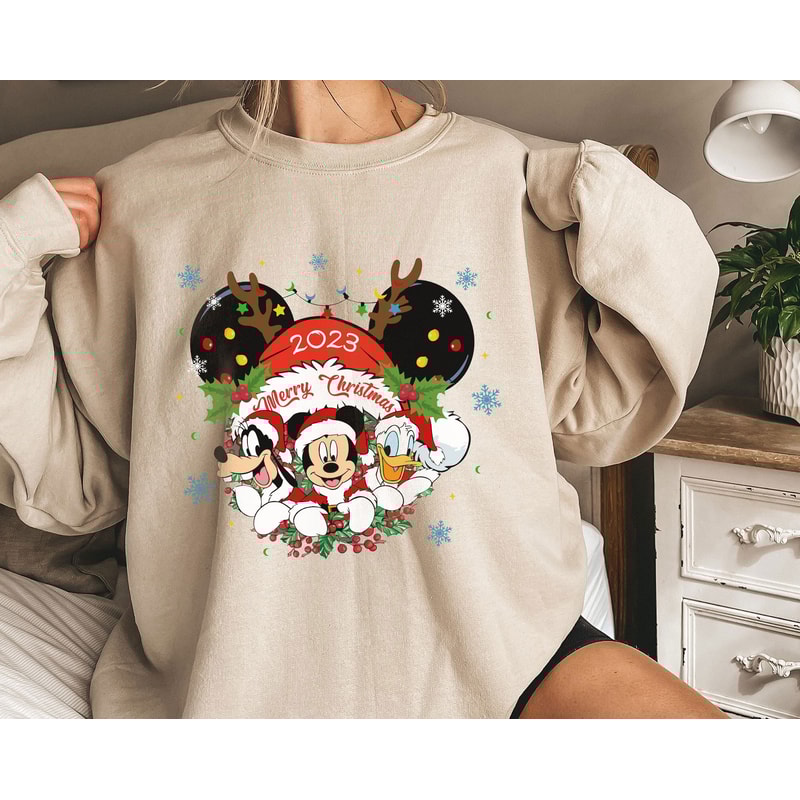 Mickey Donald Goofy Merry Christmas 2023 Mickey Ear Santa Hat Shirt Family Matching Walt Disney World Shirt Gift Ideas Men Women 1.jpg