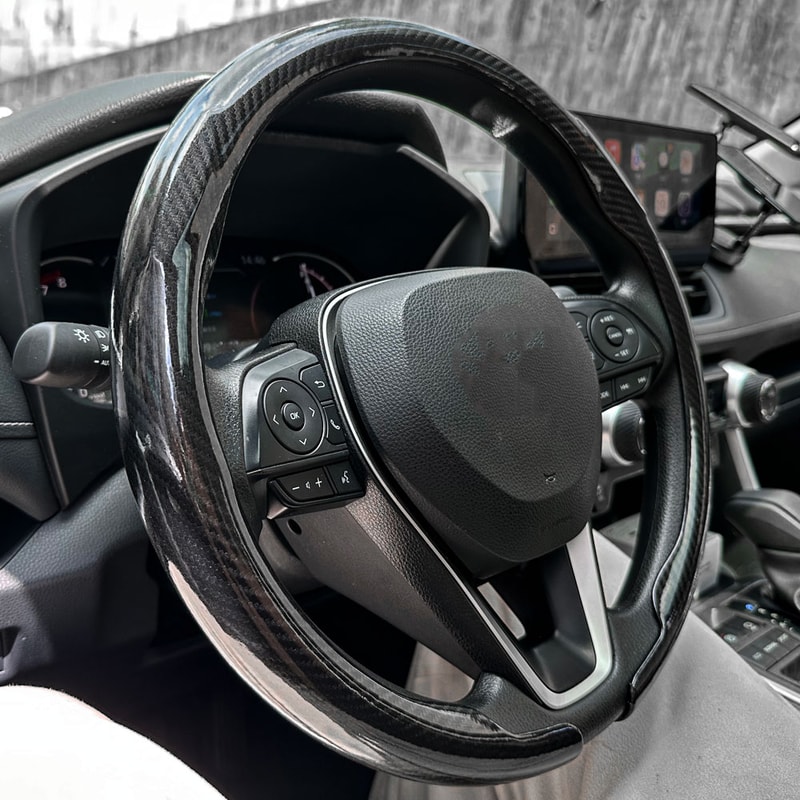 LuxeGrip Carbon Fiber Steering Wheel Cover Non Slip Breathable Luxury Auto Accessory 5
