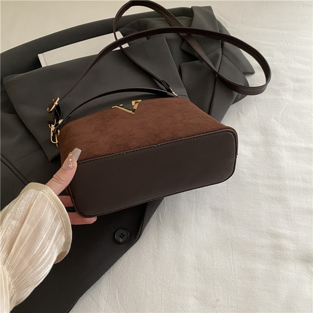 Chic Suede Handbag with V Emblem Elegant and Versatile Top Handle Bag