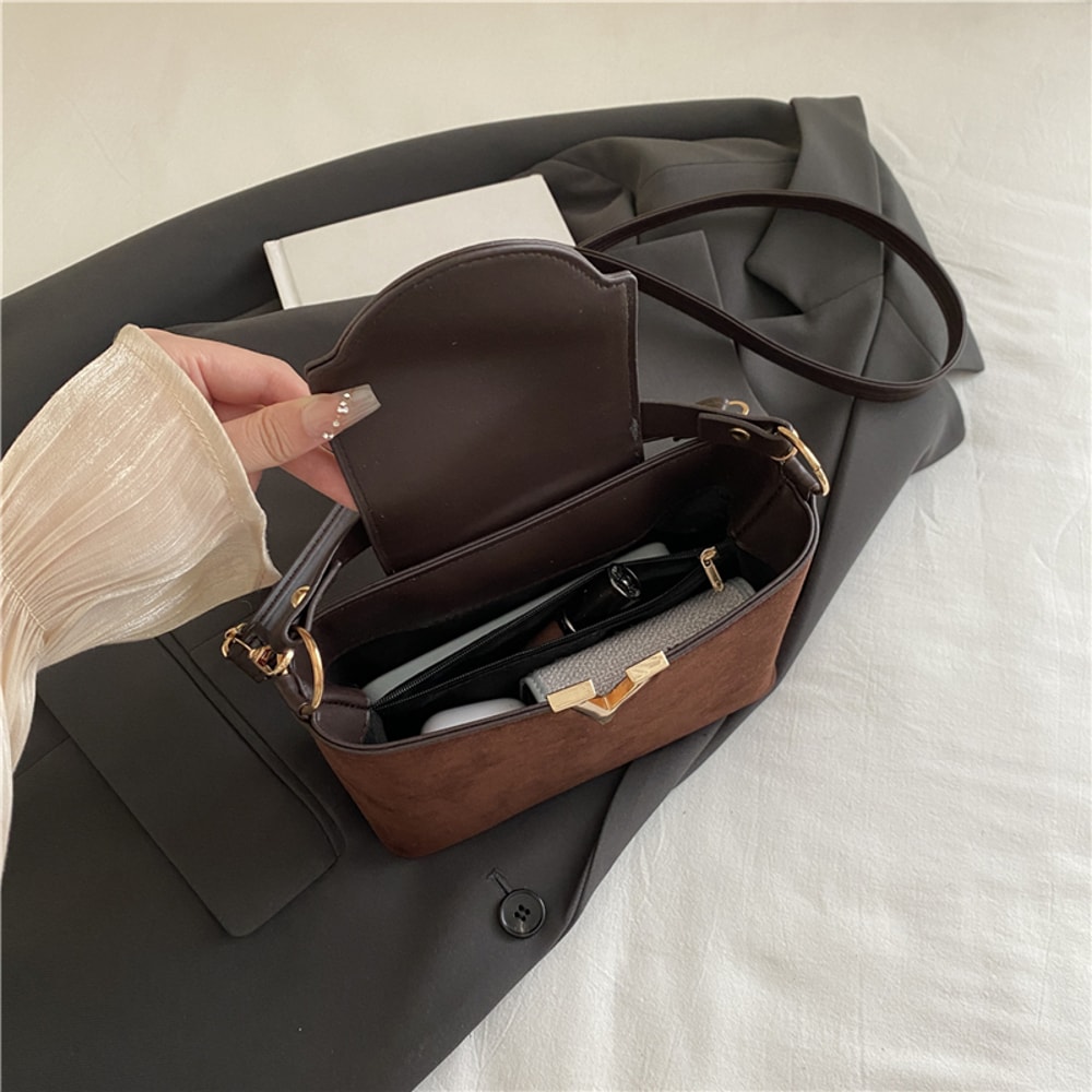 Chic Suede Handbag with V Emblem Elegant and Versatile Top Handle Bag