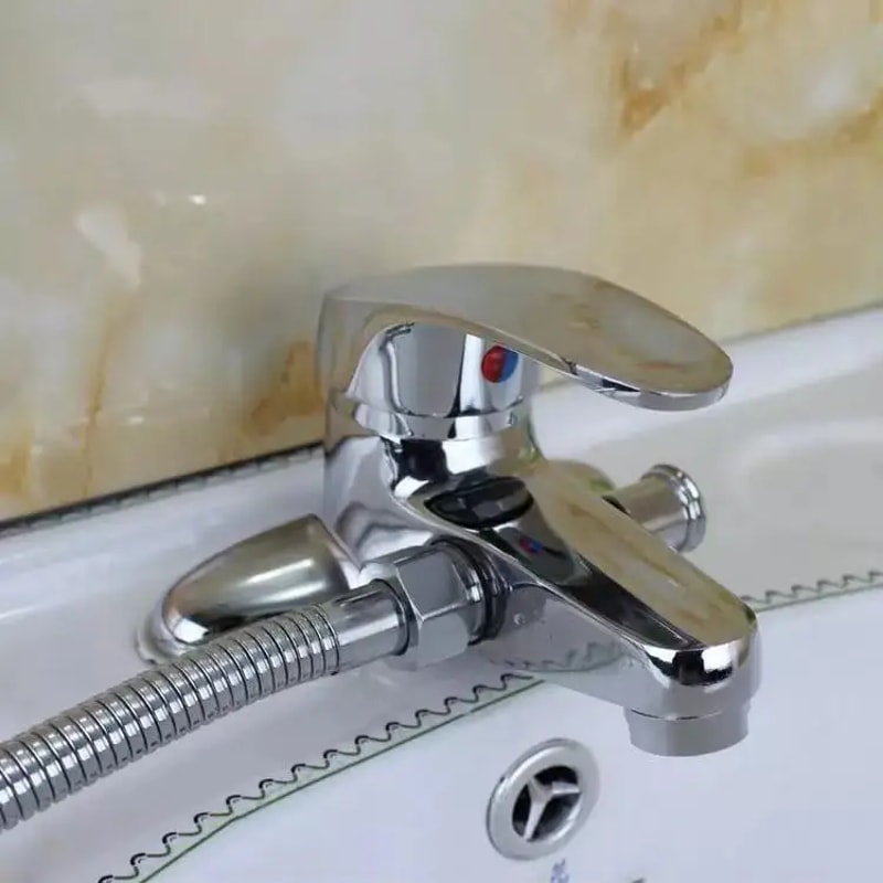 Modern Chrome Bathroom Sink Faucet Deck Mounted Hot and Cold Washbasin Mixer Tap