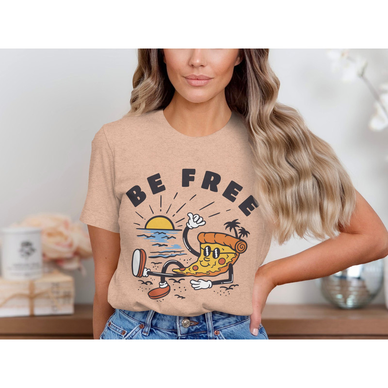 Be Free Funny Pizza Cartoon T-Shirt, Relaxing Pizza Slice Tee, Beach Sunset Graphic Shirt, Cool Pizza Lover Gift, Casual Summer Top.jpg