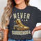 Never Surrender T-Shirt, Vintage American Flag Shoe Design, Graphic Tee, Motivational Shirt, Inspirational Apparel for Men Women.jpg
